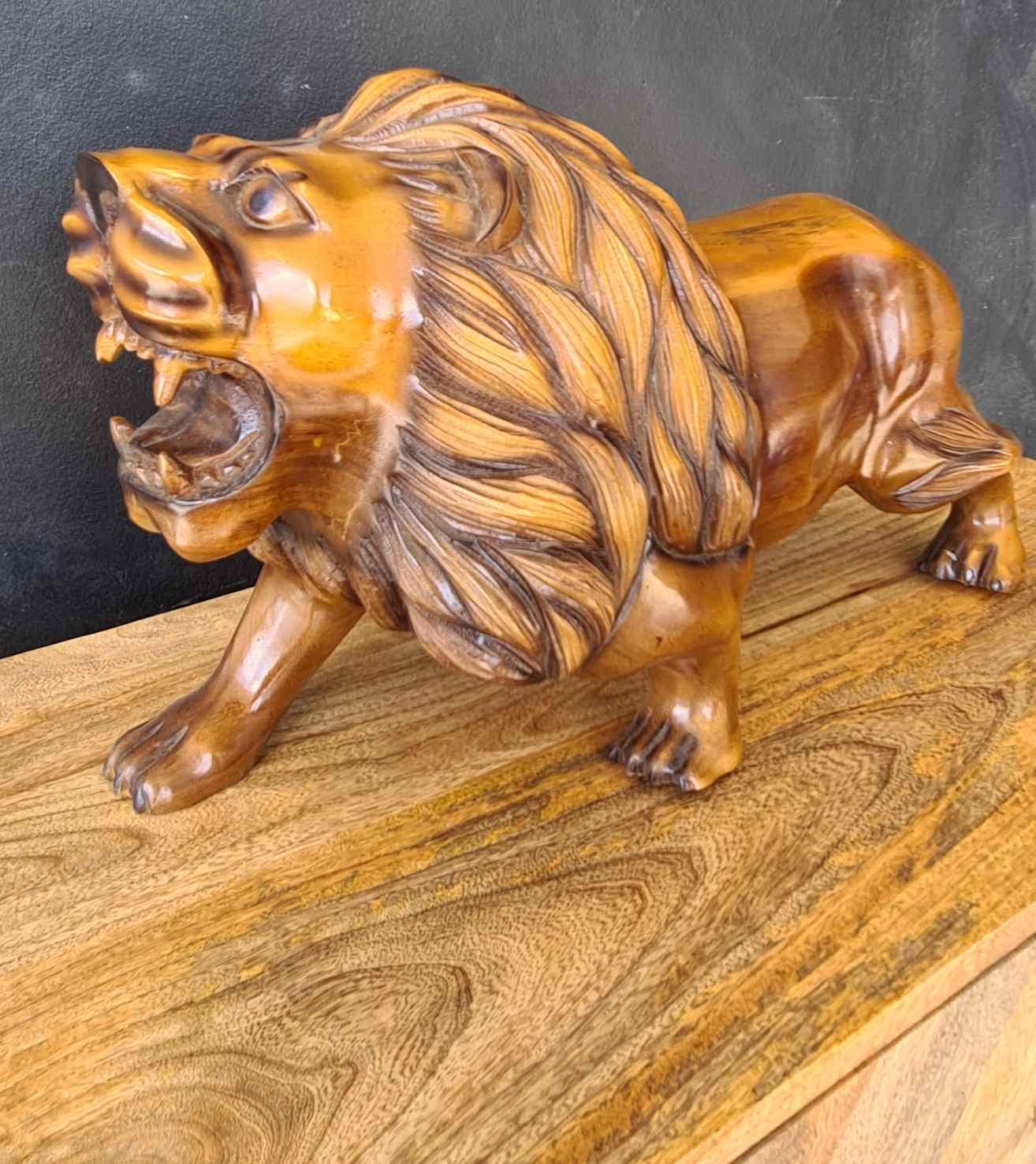 WOODEN LION STATUE