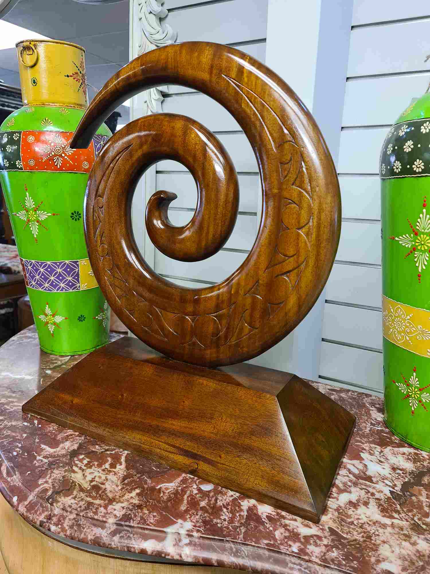 Solid wood carved koru