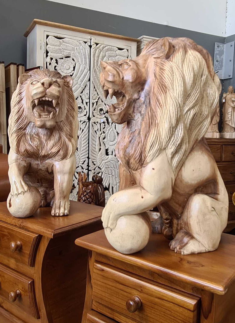 PAIR OF WOODEN LIONS